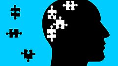 Kopf mit Puzzleteilen